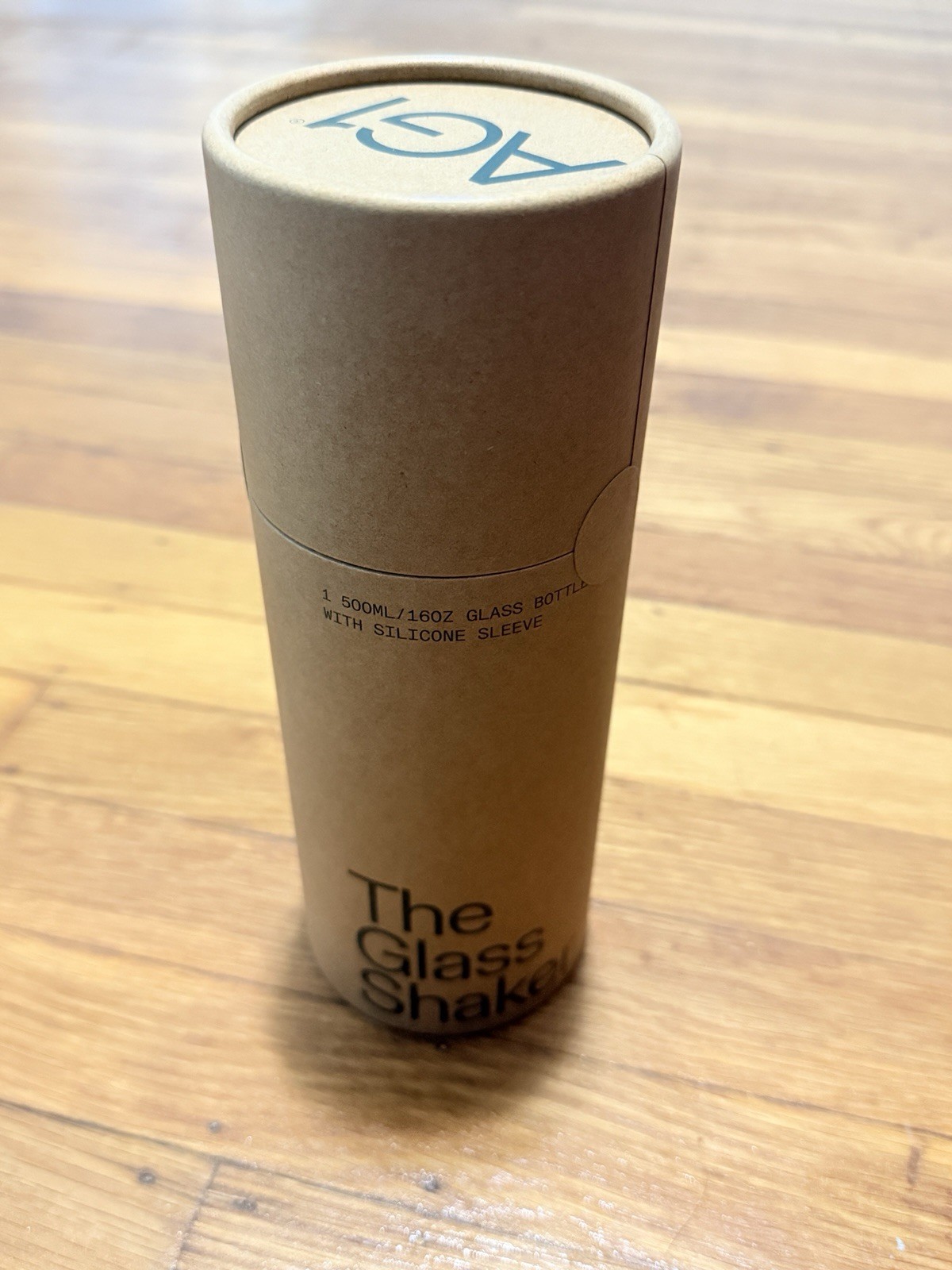 The Glass Shaker 16oz Glass Bottle Brown w/ Silicone Sleeve Screw-On Lid
